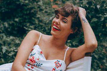 girl with mood support and background with plants